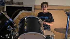 Learning to play the drums. First time playing along to music, We Will Rock You by Queen.