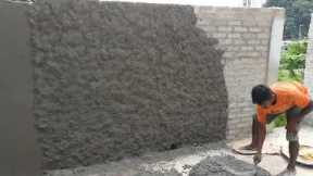 India style of plastering a wall