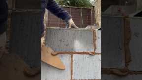 Bricklaying- Laying a block #bricklaying #bricklayer #blocklaying #masonry #construction #shorts